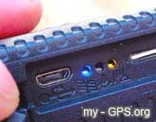 SIM card holder / slot / mount and charging socket below closure cap SIM card holder / slot / mount and charging socket below closure cap